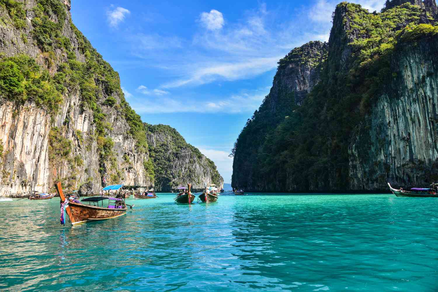 Longtail boats on a Thai beach