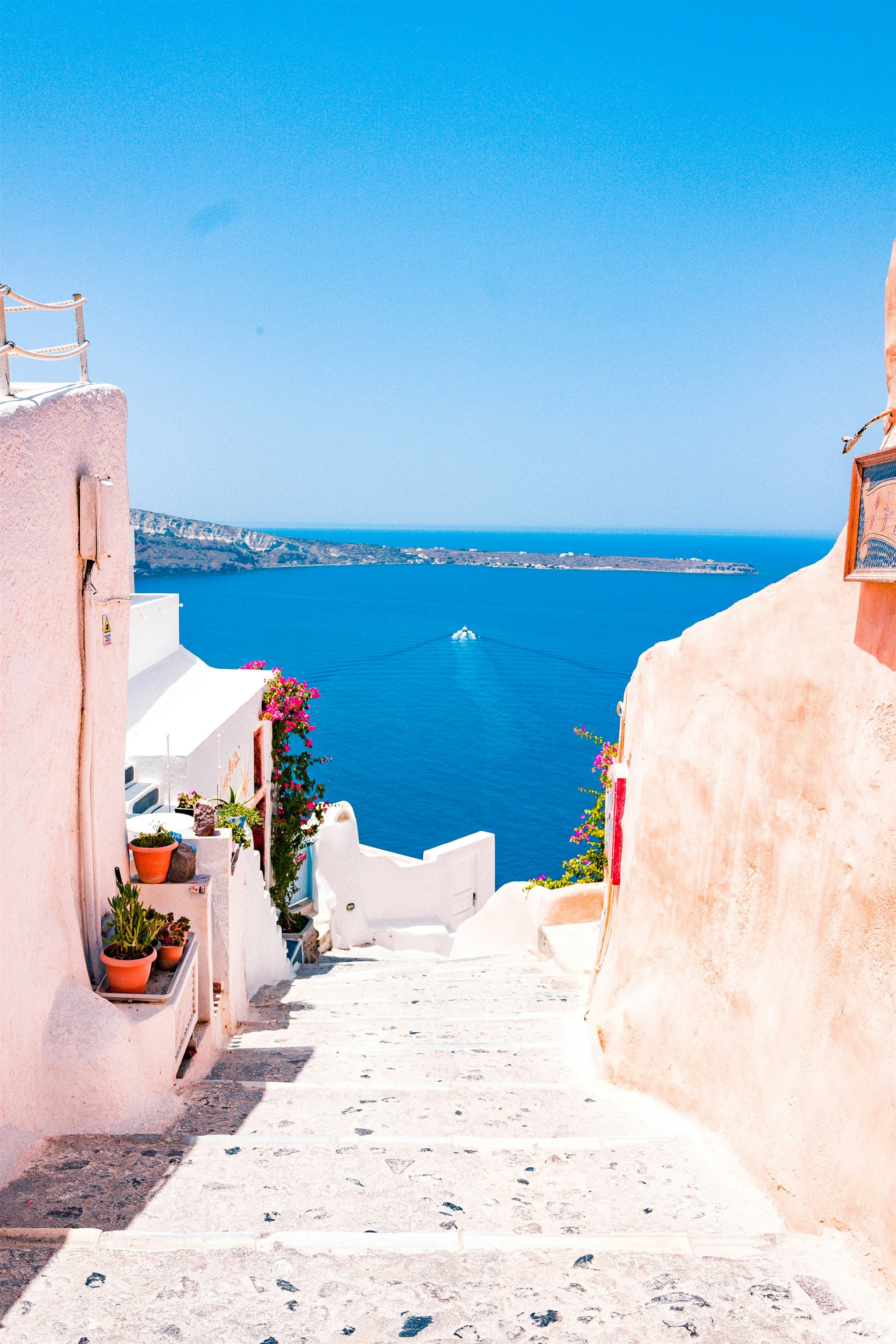 Blue-domed coastal town by the sea